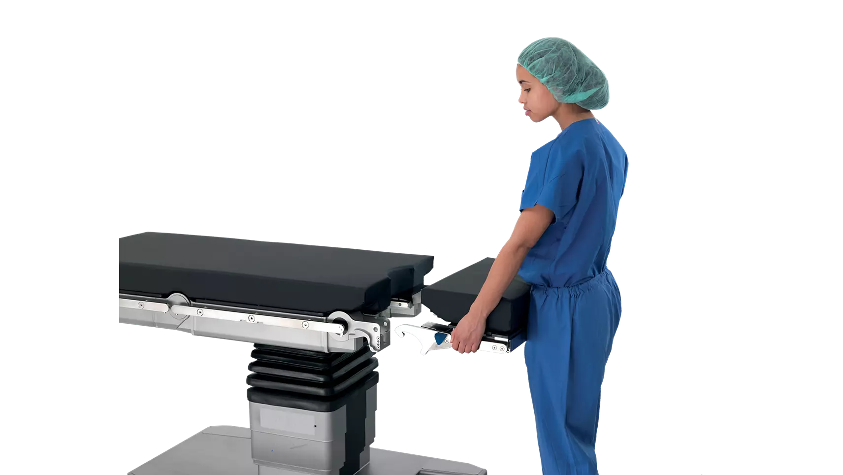 A clinician detaches a segment of the Surgical Table